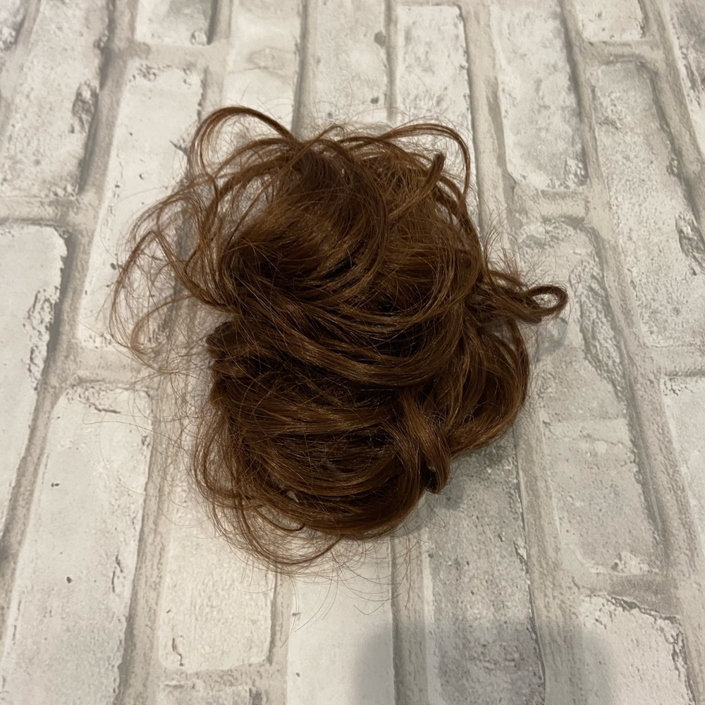 Light Auburn messy hair bun